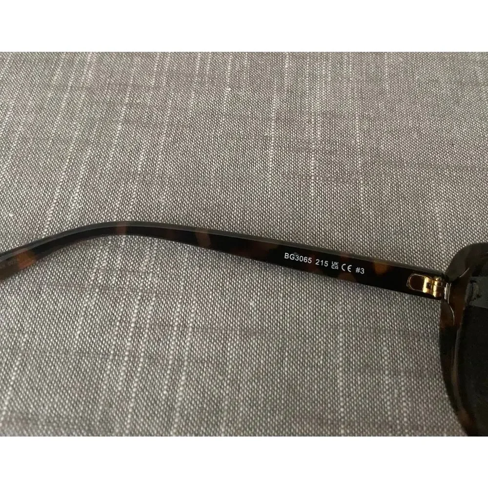 New BCBGeneration Womens Polarized Brown Tortoise Shell Oval Sunglasses